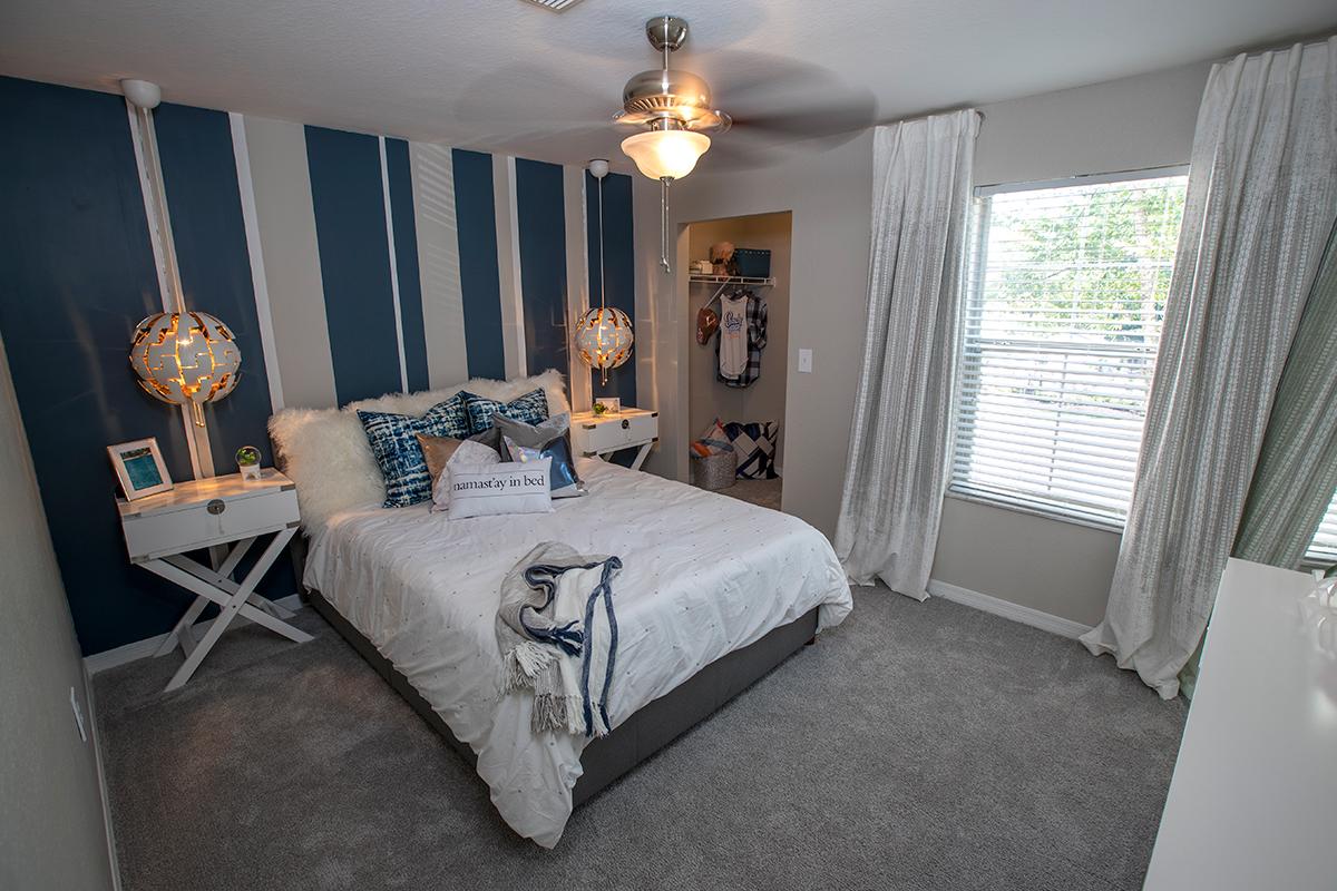 model bedroom Retreat 138 Apartments, located in the quaint community of Stockbridge, GA